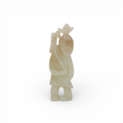 China, a celadon jade lotus leaf child, Qing dynasty (1644-1912),
