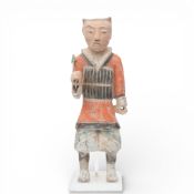 China, a painted pottery model of a warrior, in Han style,