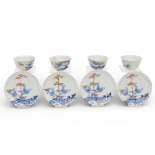 Japan, a set of four blue and white and gilt porcelain cups and saucers, 19th century,