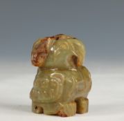 China, a yellow-green jade owl, Zhou dynasty or later,