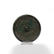China, a bronze mirror, Tang dynasty (618-907) or later,