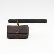 Japan, a tobacco pouch with lacquered-wood pipe case, Meiji period (1868-1912),