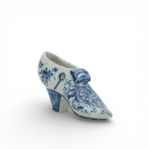 Delft, een blauwwit aardewerken model van een slipper, begin 18e eeuw,