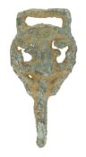 A Tudor bronze dress hook, of pierced, probably foliate form, length 38mm. &pound;40-&pound;60