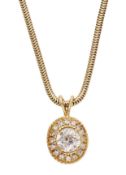 A diamond pendant, the old brilliant-cut diamond within a surround of brilliant-cut...