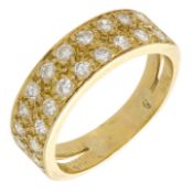 A diamond half eternity ring, the tapered band set to the front with two rows of...