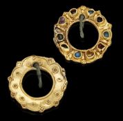 A Medieval gold and gem set annular brooch, 13th/14th century, the flat circular hoop...