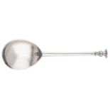 An Elizabeth I silver seal-top spoon, the fig-shaped bowl with tapered hexagonal stem,...