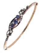 Mafeking interest: A sapphire and diamond hinged bangle, circa 1900, the upper section claw...