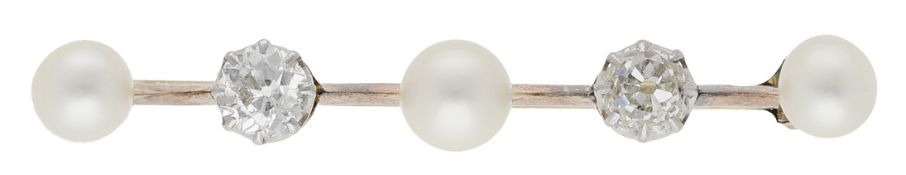 A pearl and diamond bar brooch, circa 1910, the knifewire bar set with three pearls and two...