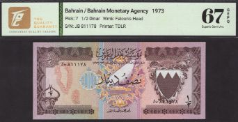 Bahrain Monetary Agency, 1/2 Dinar, L.1973, serial number JB 811178, in TQG holder 67 GEPQ,...
