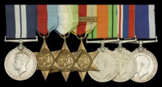 A Second War D.S.M. group of seven awarded to Warrant Engineer R. L. Mauger, Royal Navy,...