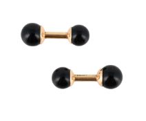 DINOS, A PAIR OF ONYX DUMBBELL CUFFLINKS