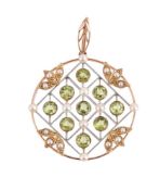 AN EDWARDIAN PERIDOT AND SEED PEARL PENDANT