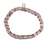 AN EARLY 20TH CENTURY REVERSE PAINTED INTAGLIO BURGEE FLAG BRACELET
