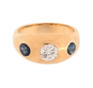 A SAPPHIRE AND DIAMOND THREE STONE RING