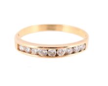 A DIAMOND HALF ETERNITY RING