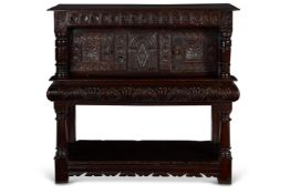 A CHARLES I OAK LIVERY OR COURT CUPBOARD, CIRCA 1630