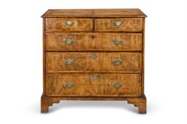 A GEORGE II WALNUT CHEST, CIRCA 1730
