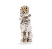 A SILVER AND SILVER GILT DOG PEPPERETTE
