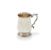 A GEORGE III SILVER BALUSTER TANKARD