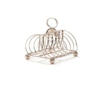 A GEORGE IV SILVER SIX DIVISION TOAST RACK