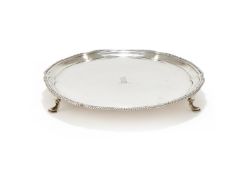 A GEORGE III SILVER SHAPED CIRCULAR WAITER
