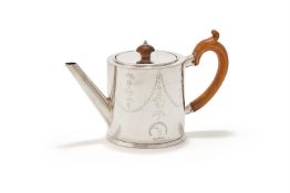 A GEORGE III SILVER CIRCULAR BACHELORS TEAPOT