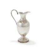 A SILVER WINE JUG