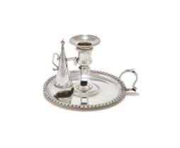 A GEORGE III SILVER CHAMBER STICK