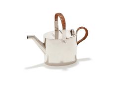 A SMALL SILVER WATERING CAN