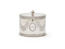 A GEORGE III SILVER OVAL TEA CADDY