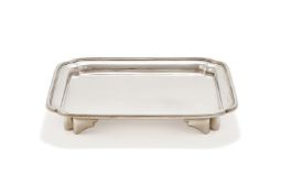A SILVER SHAPED SQUARE TRAY