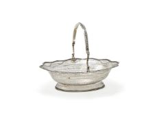 A GEORGE III SILVER SHAPED OVAL SWING HANDLED BASKET