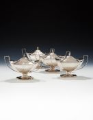 A SET OF FOUR GEORGE III SILVER SAUCE TUREENS