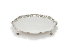 A SILVER SHAPED CIRCULAR SALVER