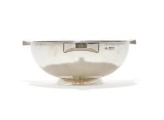 AN EDWARDIAN SILVER THREE HANDLED QUAICH
