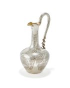 A VICTORIAN SILVER OINOCHOE FORM EWER