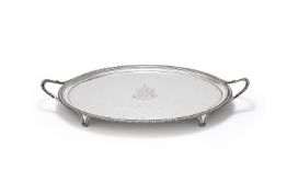 A GEORGE III SILVER OVAL TWIN HANDLED TRAY