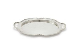 A SILVER SHAPED OVAL TWIN HANDLED TRAY