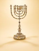 AN ISRAELI SILVER, SILVER GILT AND LAPIS LAZULI MENORAH