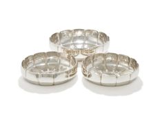 A SET OF THREE SILVER SHAPED CIRCULAR BOWLS