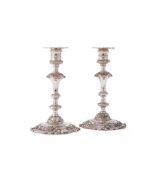 A PAIR OF VICTORIAN CAST SILVER CANDLESTICKS