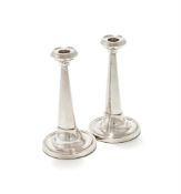 A PAIR OF SILVER TAPERING CANDLESTICKS