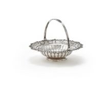 A GEORGE IV SILVER SHAPED CIRCULAR SWING HANDLED BASKET