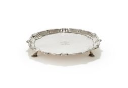 A GEORGE III SILVER SHAPED CIRCULAR WAITER