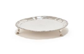 A SMALL GEORGE III SILVER SHAPED CIRCULAR SALVER