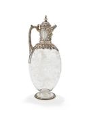 A VICTORIAN PARCEL GILT SILVER MOUNTED STOURBRIDGE GLASS CLARET JUG
