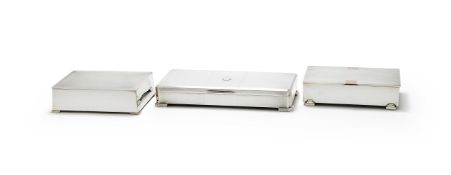 A SILVER RECTANGULAR TABLE BOX