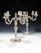 A PAIR OF SILVER FOUR LIGHT CANDELABRA
